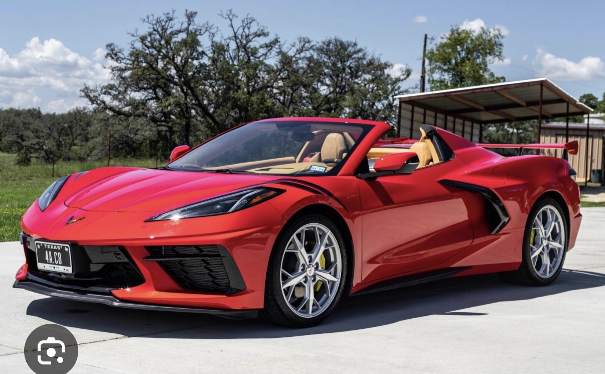 Cole's signature red Corvette